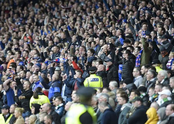 Rangers fans celebrate after beating Celtic in Scottish Cup semi final. Picture: SNS Group/Craig Williamson