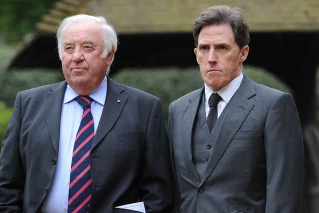 Jimmy Tarbuck and Rob Brydon arrive for the funeral of entertainer Ronnie Corbett. Photo by Stuart C. Wilson/Getty Images.