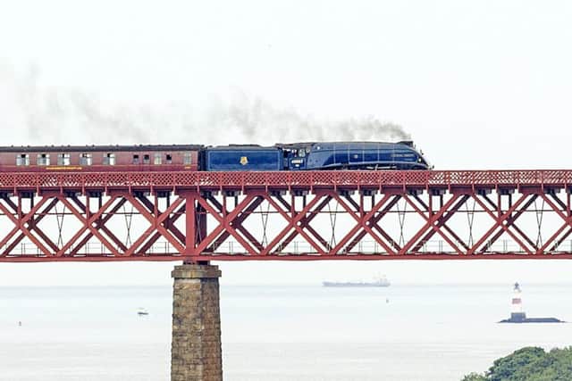 A steam train on the Forth Bridge. Picture: Malcolm McCurrach