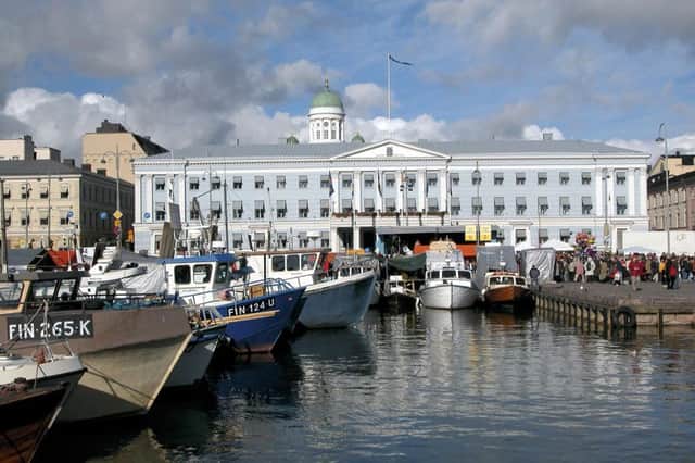 Helsinki's blue and white city hall and its snow-white landmark cathedral. Picture: Paal Aarseather/Getty Images