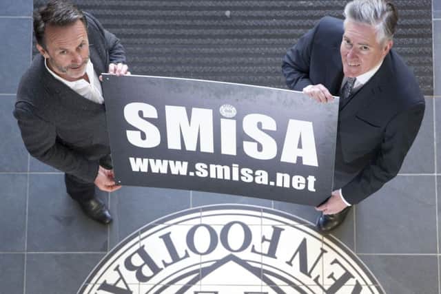 Former St Mirren director Gordon Scott, left, with St Mirren Independent Supporters Association chairman George Adam. Picture: Jeff Holmes