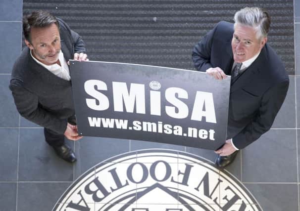 Former St Mirren director Gordon Scott, left, with St Mirren Independent Supporters Association chairman George Adam. Picture: Jeff Holmes