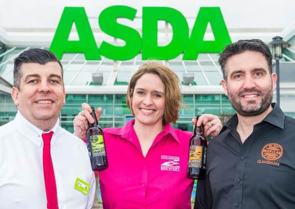 Asda's Brian O'Shea, left, with Heather McDonald and Chris Miller. Picture: Ian Georgeson