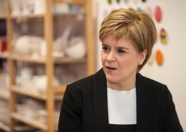 First Minister Nicola Sturgeon has pledged the SNP's support for trade unions if the party is re-elected in the May election. Picture: John Devlin