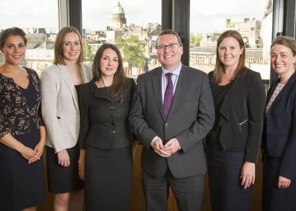 Anderson Strathern managing partner Murray McCall with some of the firm's young team. Picture: Jane Barlow