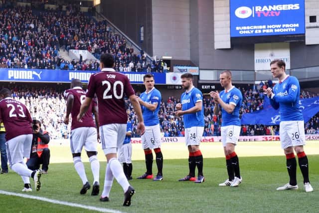 Rangers gave Hearts a guard of honour after Hibs' Edinburgh rivals won last season's Scottish Championship crown. Picture: SNS