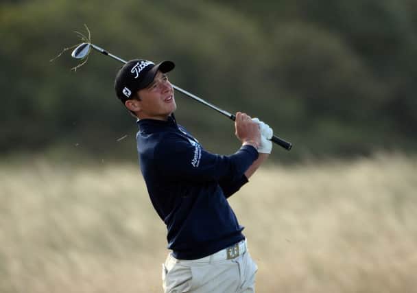 Scots golfer Ewen Ferguson injured his pinkie while playing basketball. Picture: Ross Kinnaird/R&A via Getty Images