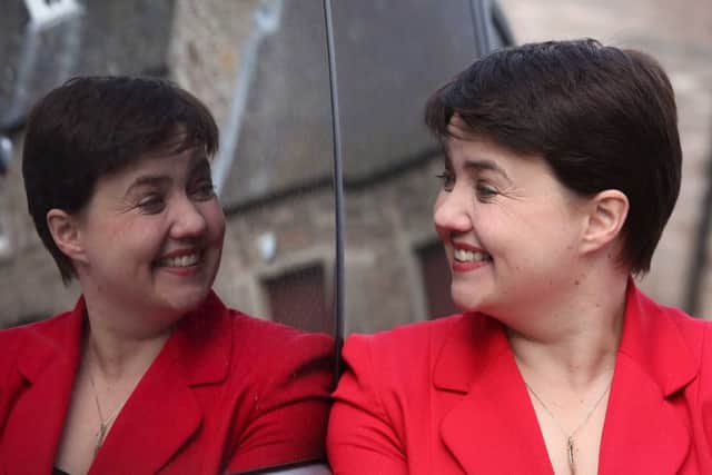 Ruth Davidson the Scottish Conservative leader smiles at her reflection. Picture: Allan Milligan.