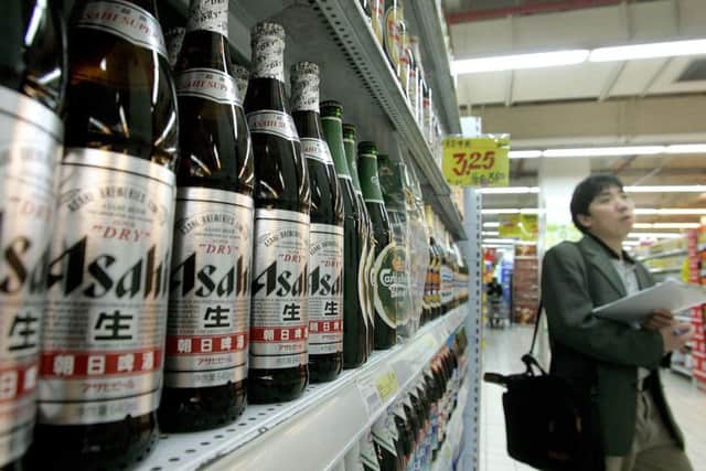 Japan's Asahi is buying the Grolsch, Meantime and Peroni brands. Picture: Liu Jin/AFP/Getty Images