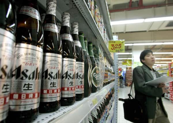 Japan's Asahi is buying the Grolsch, Meantime and Peroni brands. Picture: Liu Jin/AFP/Getty Images