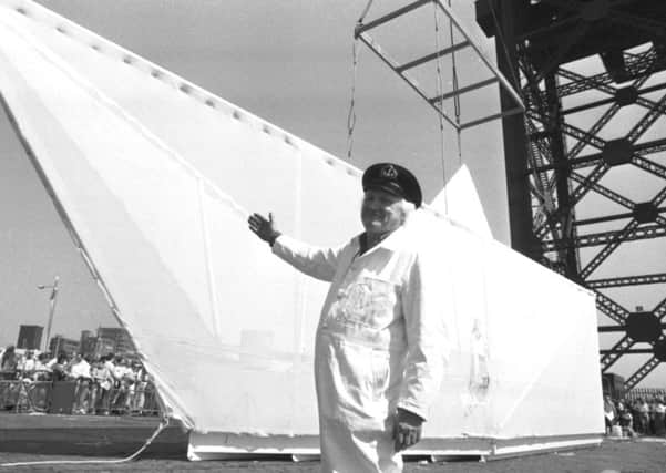 The paper boat made by Scottish artist George Wyllie is launched onto the River Clyde in May 1989