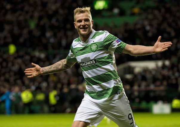 John Guidetti celebrates after scoring Celtic's equaliser in the 3-3 draw with Internazionale. Picture: SNS