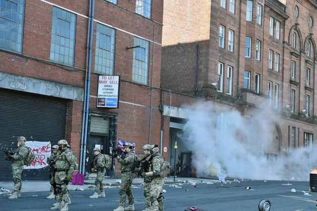 Actors perform during filming for a new low budget horror film Zombie Apocalypse. Picture: Getty Images