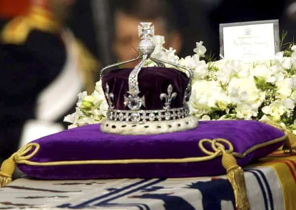 The Koh-i-noor diamond set in the Maltese Cross at the front of the crown made for Britain's late Queen Mother Elizabeth. Picture: AP