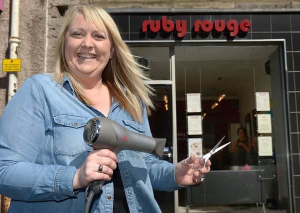 Ruby Rouge owner Rosalind Temple will be stepping aside to let actors take over her salon every night.  Picture: Neil Hanna