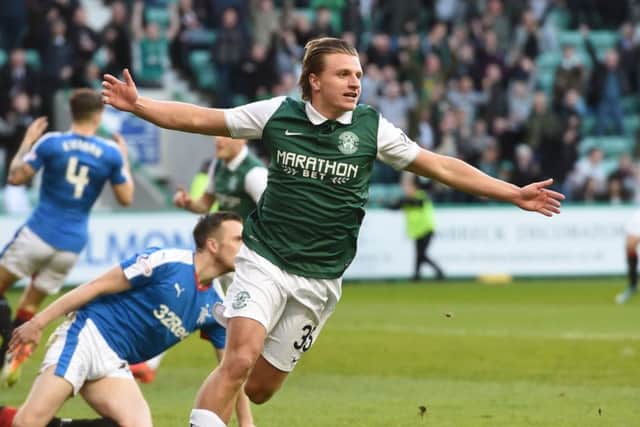 Hibernian's Jason Cummings celebrates after opening the scoring. Picture: SNS