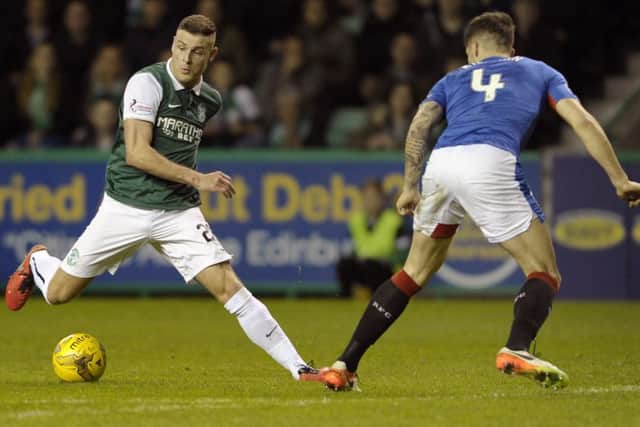 Anthony Stokes takes on Rob Kiernan of Rangersin Hibs' 3-2 win. Picture: Neil Hanna