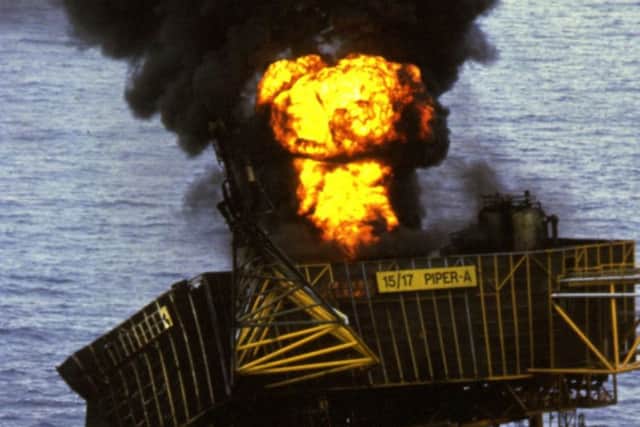 A fire burns on the North Sea oil rig Piper Alpha after an explosion July 1988 which killed more than 160 people