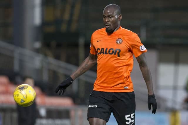 Guy Demel is desperate not to have a relegation on his CV. Photograph: Kenny Smith/SNS