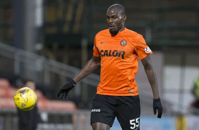 Guy Demel is desperate not to have a relegation on his CV. Photograph: Kenny Smith/SNS