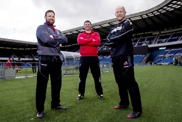 Edinburgh coaches Steve Scott, left, Pete Wilkins and Duncan Hodge who have all signed new deals. Picture: SNS
