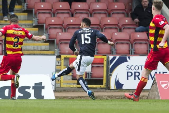 Dundee's Kane Hemmings scores his second of the match. Picture: SNS