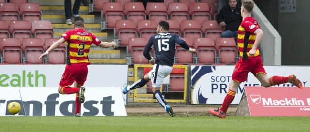 Dundee's Kane Hemmings scores his second of the match. Picture: SNS