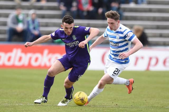 Hibs' John McGinn (left) and Declan McManus battle for the ball. Picture: SNS