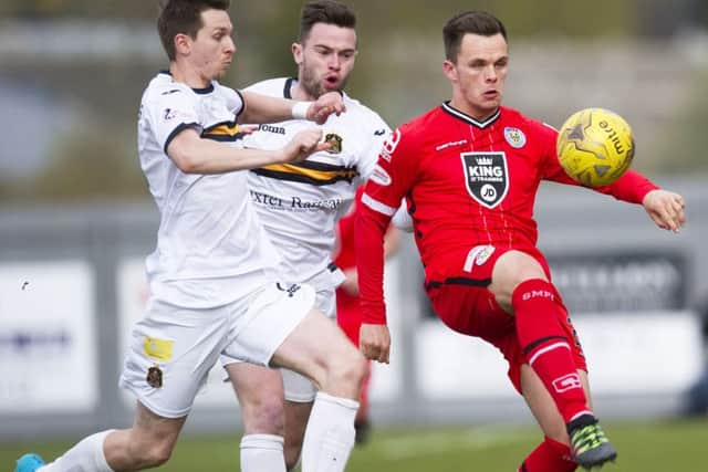 St Mirren's Lawrence Shankland, right, controls the ball against Dumbarton. Picture: Gary Williamson/SNS