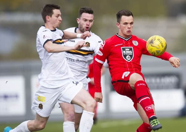 St Mirren's Lawrence Shankland, right, controls the ball against Dumbarton. Picture: Gary Williamson/SNS