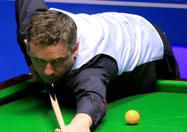 Alan McManus came from behind to beat Ali Carter at the Crucible. Picture: Tim Goode/PA Wire