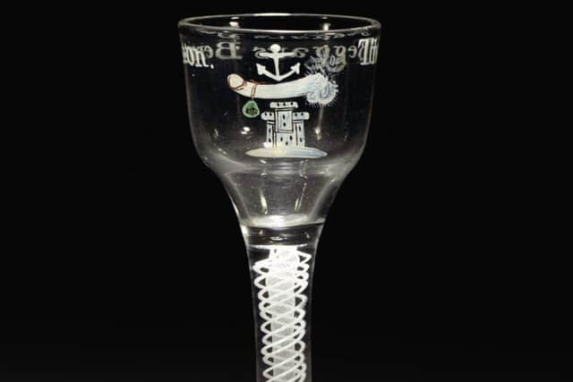 A rare enamelled 'Beggar's Benison' opaque-twist wine glass, circa 1700. Picture:Sothebys.