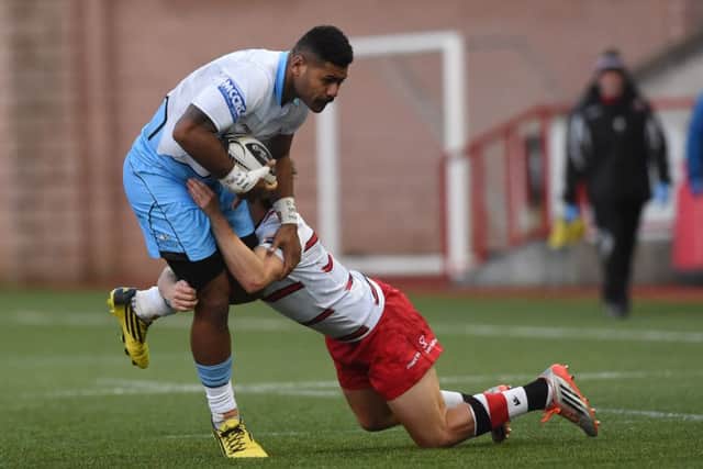 Glasgow's Junior Bulumakau (left) has signed a new one-year deal. Picture: SNS
