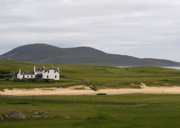 Taransay, the 3445-acre island off west Harris made famous by the BBC Castaway reality TV series. Pictured is the isle of Taransay in the distance as seen from Borve on the Isle of Harris. Picture: Jane Barlow