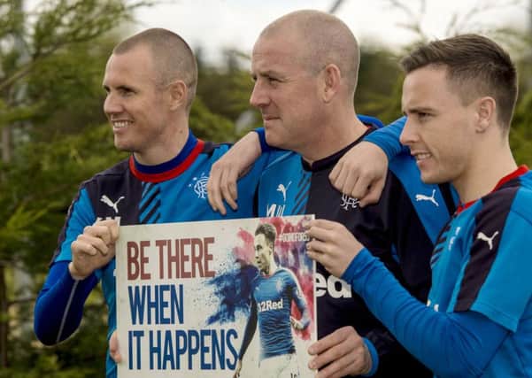 Rangers manager Mark Warburton, centre, with Kenny Miller, left, and Barrie McKay promote Rangers 2016/17 season tickets going on sale. Picture: Craig Williamson/SNS