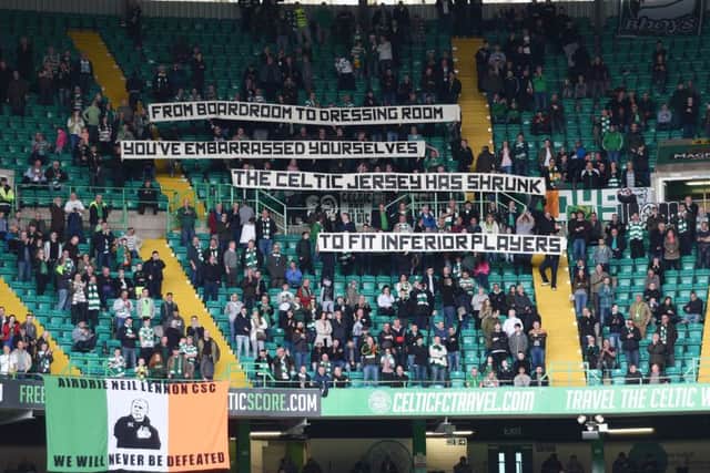 Celtic fans display a banner during the club's 1-1 draw with Ross County. Picture: SNS