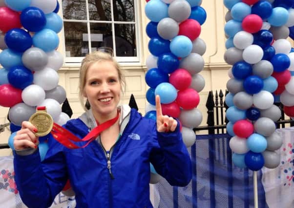 Heather Duff with her marathon medal. Picture: contributed