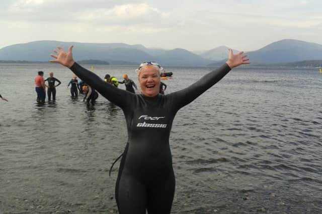 A swimmer takes part in the Great Scottish Swim at Loch Lomond
