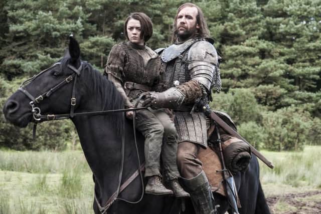Maisie Williams, left, and Rory McCann in HBO's "Game of Thrones." (Helen Sloan/HBO)