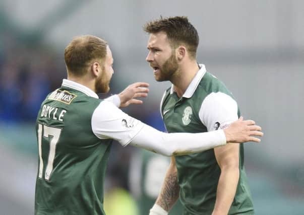 Hibs hat-trick hero James Keatings, right, celebrates his second goal with Martin Boyle. Picture: Greg Macvean