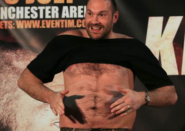 Tyson Fury taunted Wladimir Klitschko in front of the media. Picture: PA