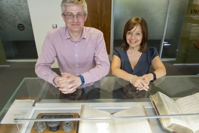 Leading the drive to take the land registry online are Charles Keegan, left, and Karen Alexander, pictured at Registers of Scotland, Meadowbank House, Edinburgh. Picture: Ian rutherford