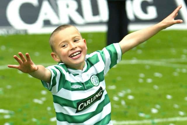 Jordan celebrating at Celtic Park in 2004 after his father helped Celtic clinch the league title. Picture: PA