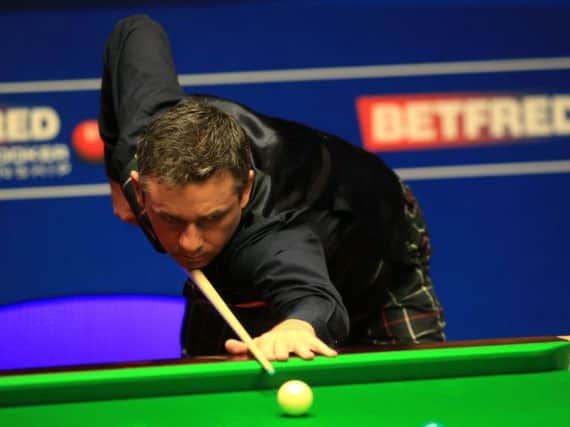 Alan McManus in action against Ding Junhui at the Betfred Snooker World Championships at the Crucible. Picture: Mike Egerton/PA Wire