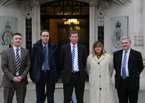 Simon Calvert (left) with campaigners opposed to compulsory "state guardians" plans at the Supreme Court. Picture: Contributed