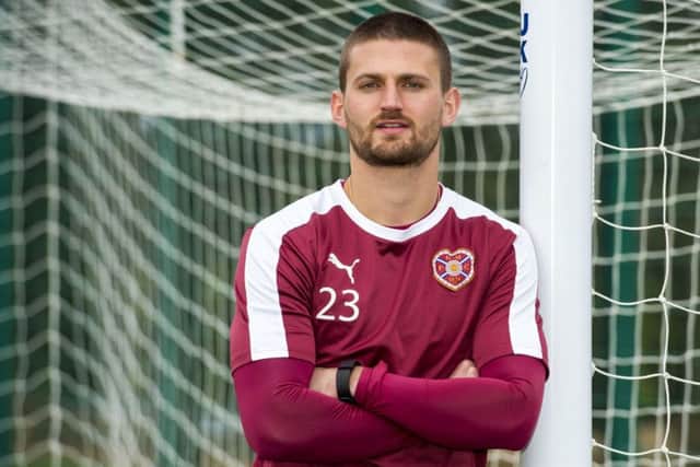 Hearts midfielder Perry Kitchen is not giving up hope of securing a second-place finish in the Premiership. Picture: SNS