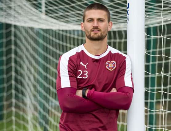 Hearts midfielder Perry Kitchen is not giving up hope of securing a second-place finish in the Premiership. Picture: SNS