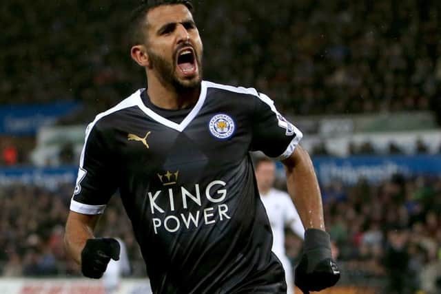 Riyad Mahrez celebrates a goal for Leicester - but the Algerian has revealed he escaped from a trial with St Mirren. Picture: AFP/Getty Images