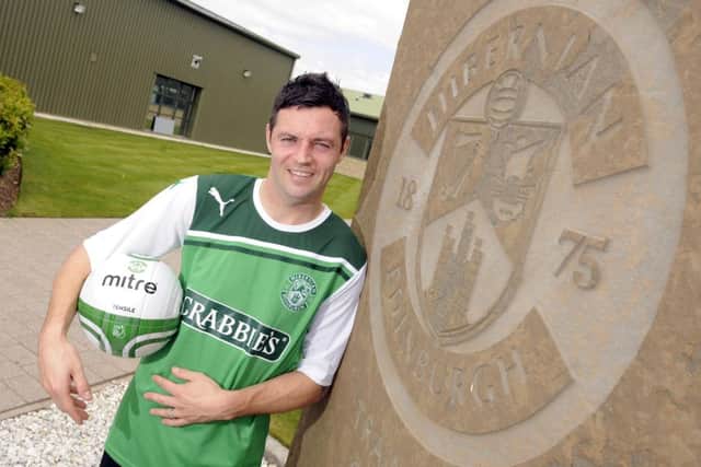Ivan Sproule pictured at the Hibs Training Centre in June 2011 after signing on for a second spell in green and white. Picture: Greg Macvean