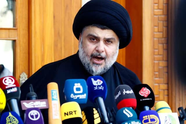 Iraqi Shiite Muslim cleric Moqtada al-Sadr speaks during a press conference in the holy Shiite city of Najaf o Picture: AFP PHOTO / HAIDAR HAMDANI